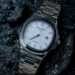 PP Smooth Bezel Date Watch in White – Elegant stainless steel men’s wristwatch with date feature