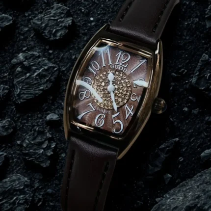 Brown strap golden case brown dial