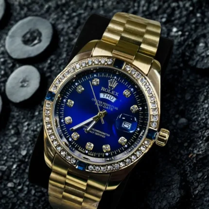 Gold Watch with Blue Sunburst Dial and Crystal Bezel