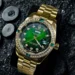 Gold Watch with Green Sunburst Dial and Crystal Bezel