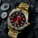Gold Watch with Red Sunburst Dial and Crystal Bezel