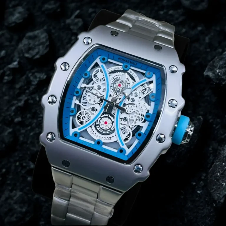 Luxury inspired silver stainless steel tonneau watch blue dial