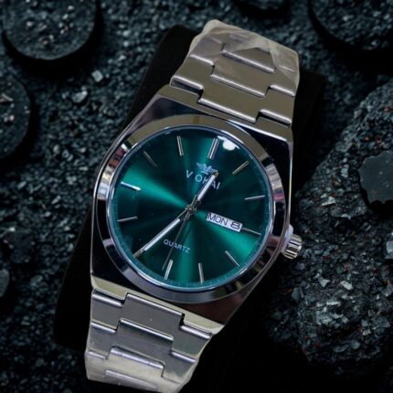 Silver PRX stainless-steel watch with green dial