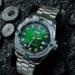 Silver Watch with Green Sunburst Dial and Crystal Bezel