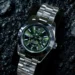 Silver bracelet ladies luxury watch with green dial, dual time display and annual calendar function